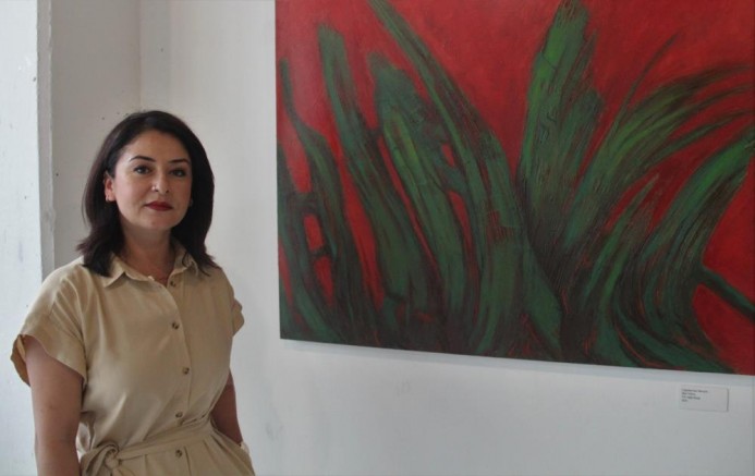 Resim sergisiyle orman yangınlarına ve deniz kirliliğine dikkat çekti